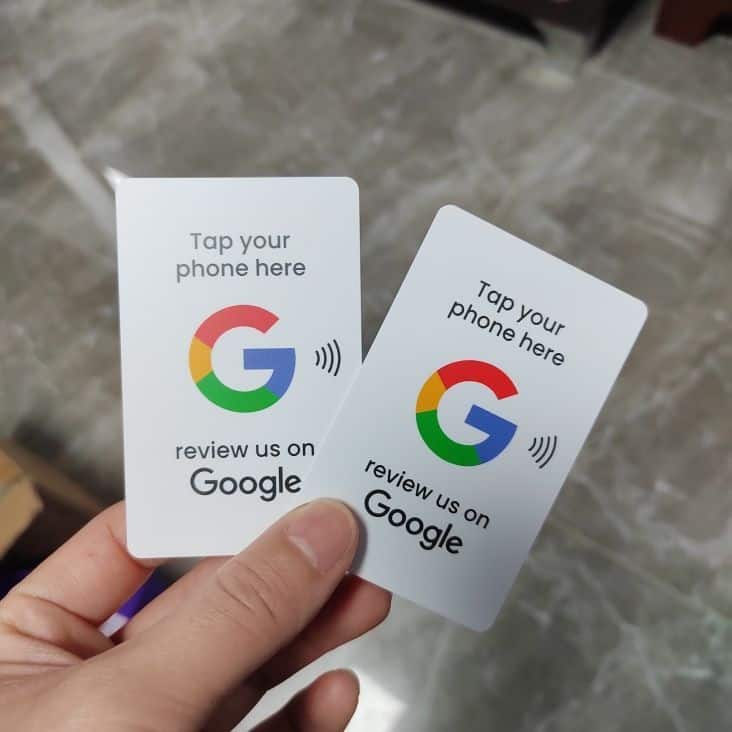 Two cards with the google logo on them.